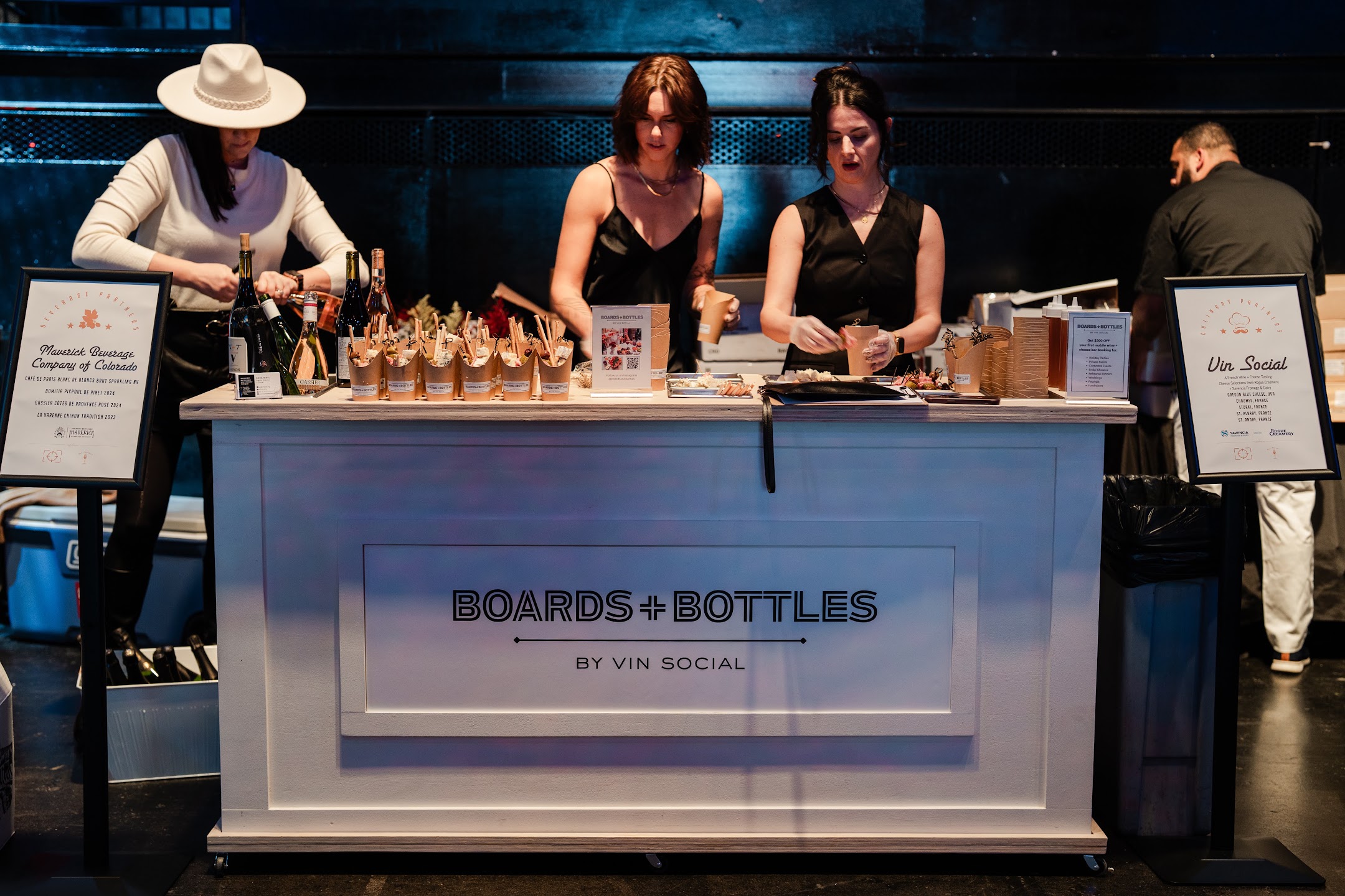 French wine service and guests at Beaujolais & Beyond in Denver