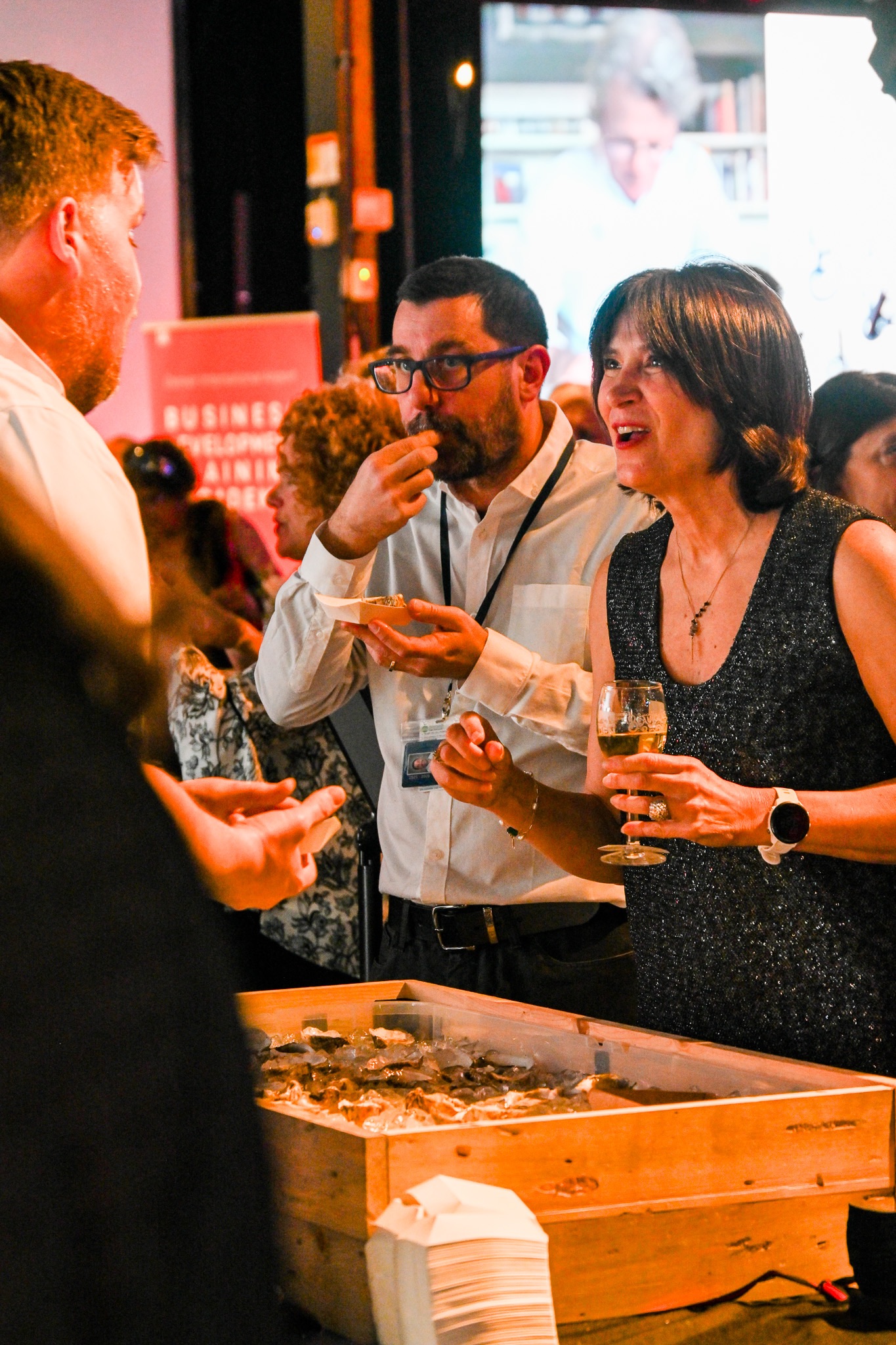 Guests tasting and speaking with a culinary partner