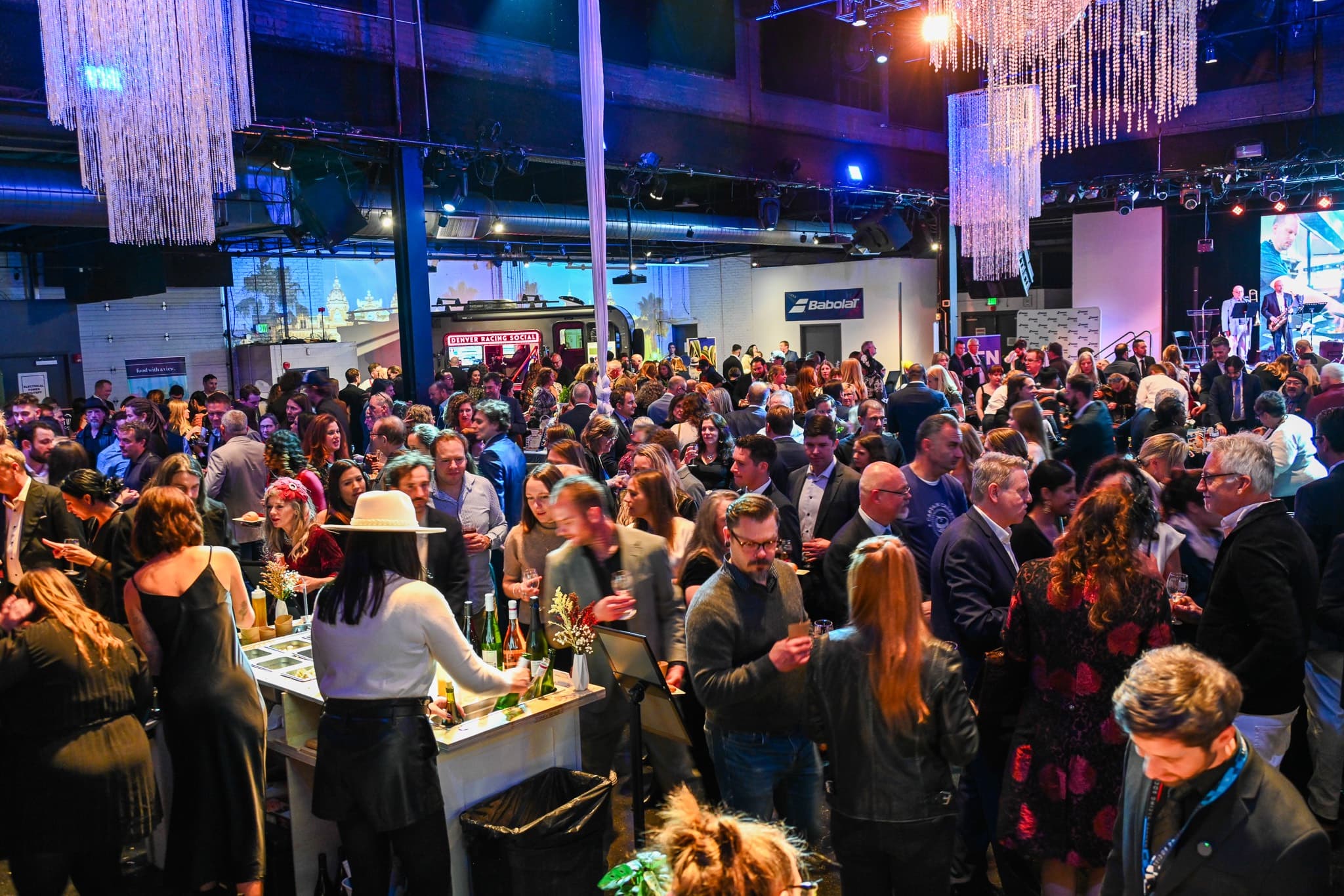 Guests gathering around culinary and wine partners